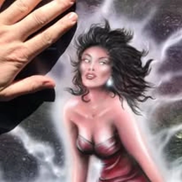 Airbrushed artwork the size of a hand, depicting a woman in a purple dress with storm and lightning background. A hand shows the scale.

