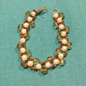 Green and white and golden colored beaded+cristals bracelet