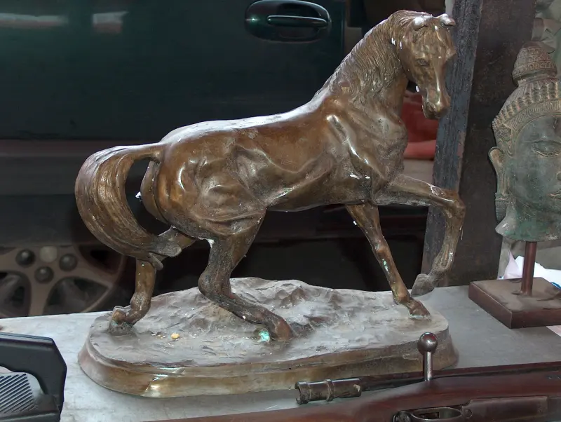 Bronze horse statue about 60–70 cm long, displayed at the Budaörs Flower Market Fair in October 2005