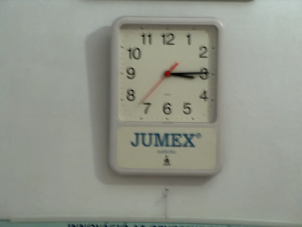 Wall clock showing the departure time to Mátészalka. 03:15 AM. 