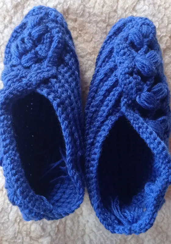 Blue crocheted shoes